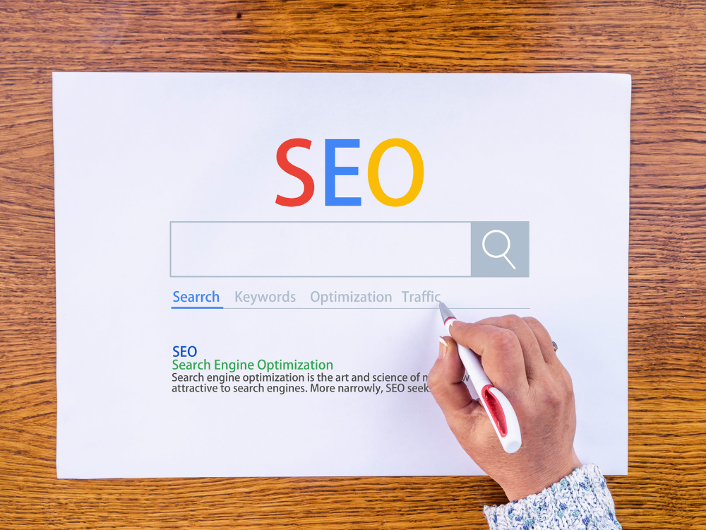 Search engine optimization seo text written on paper to look like a Google Search