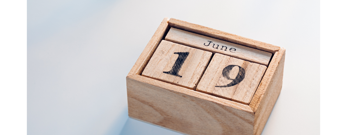 a wooden block calendar with date and month