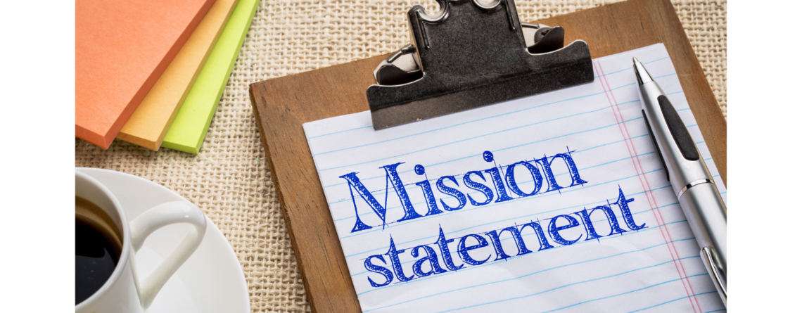 a clipboard with a piece of paper on it that says mission statement